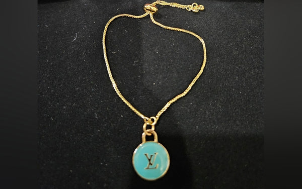 Louis Vuitton aqua charm