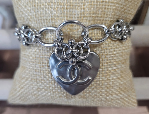 Chanel Silver charm on silver bracelet