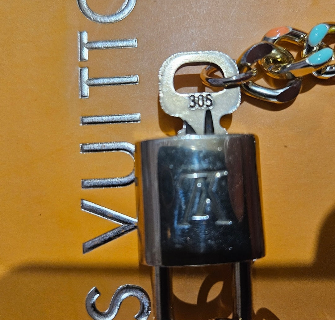 Gold Louis Vuitton Lock #305 multicolored braclet