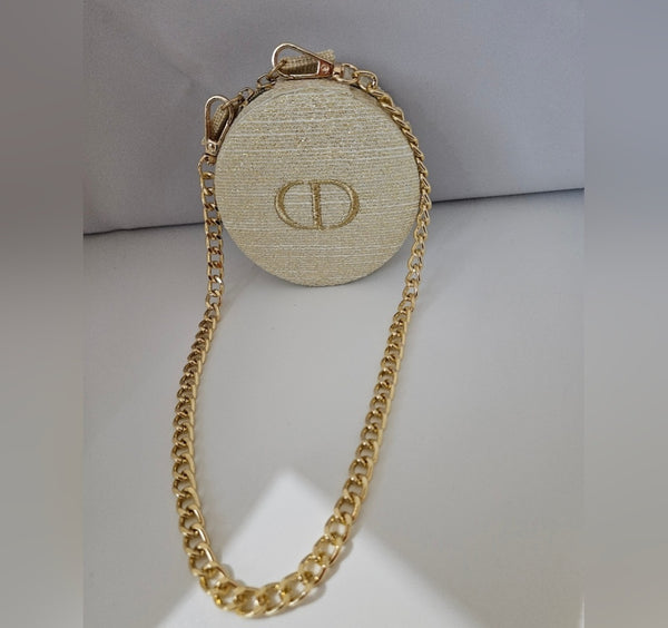 Dior round zippered pouch with gold shoulder strap