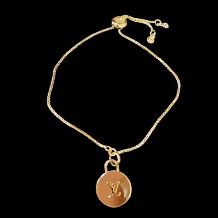 Louis Vuitton Charm on Gold Bracelet
